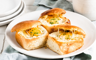 over-easy egg in brioche dinner rolls | bakerly
