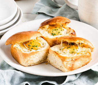 over-easy egg in brioche dinner rolls | bakerly