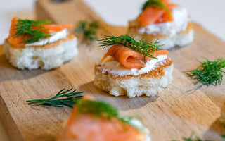 smoked salmon appetizer on sliced brioche | bakerly