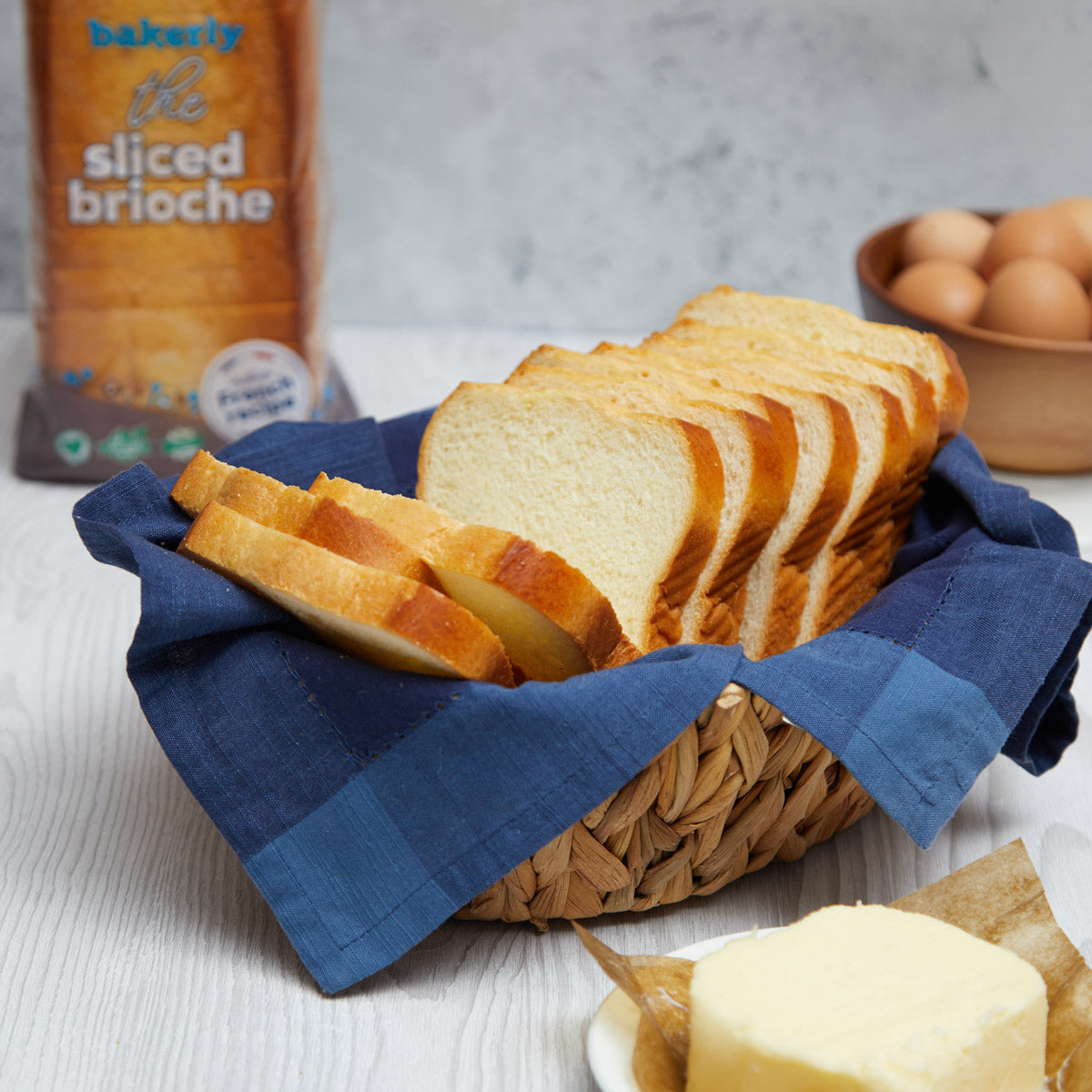 image of basket containing bakerly sliced brioche